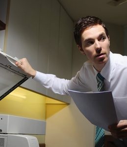 Man secretly copying documents